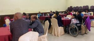 participants sitting in the hall and listening the presentation