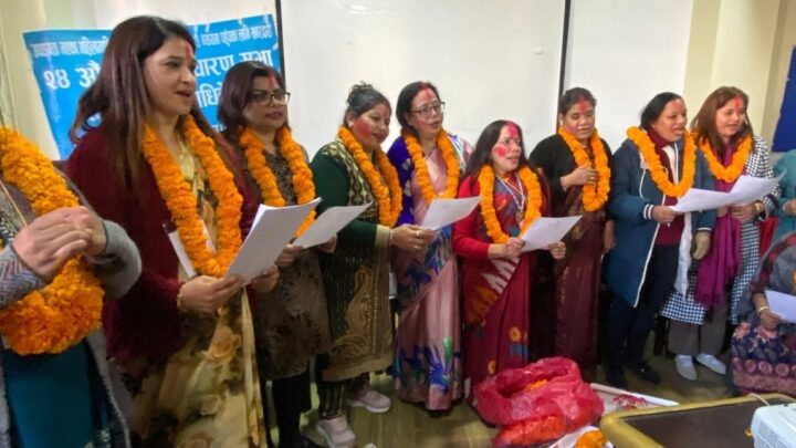 Newly elected committee taking an Oath